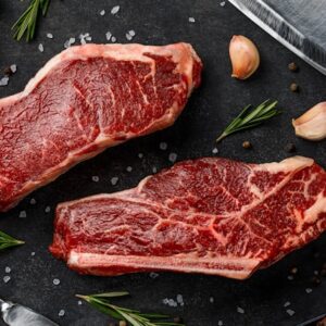 Raw striploin and bone-steak